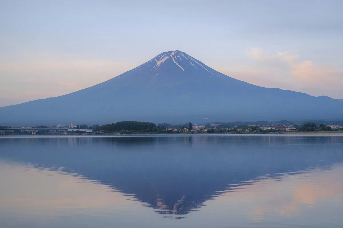 Mount Fuji reflected in the still waters of Lake Kawaguchi